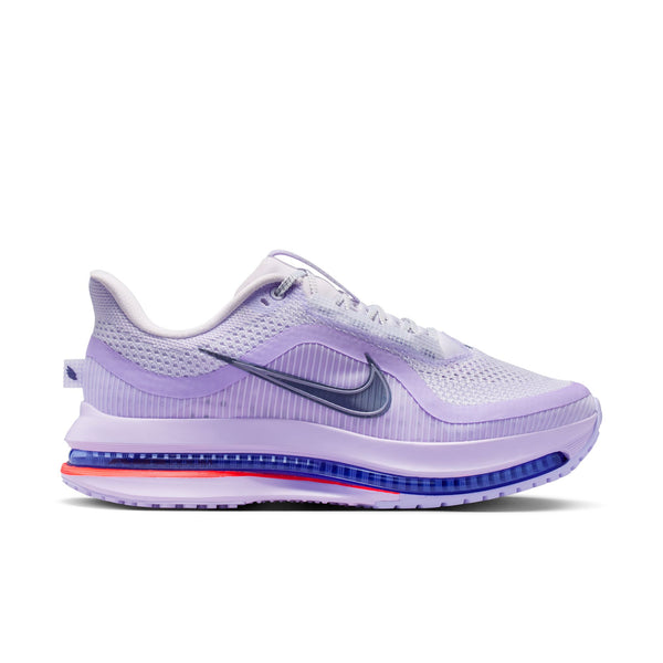 Purple Nike running shoe with  air pods that wrap around the shoe in a slightly darker color than the upper.