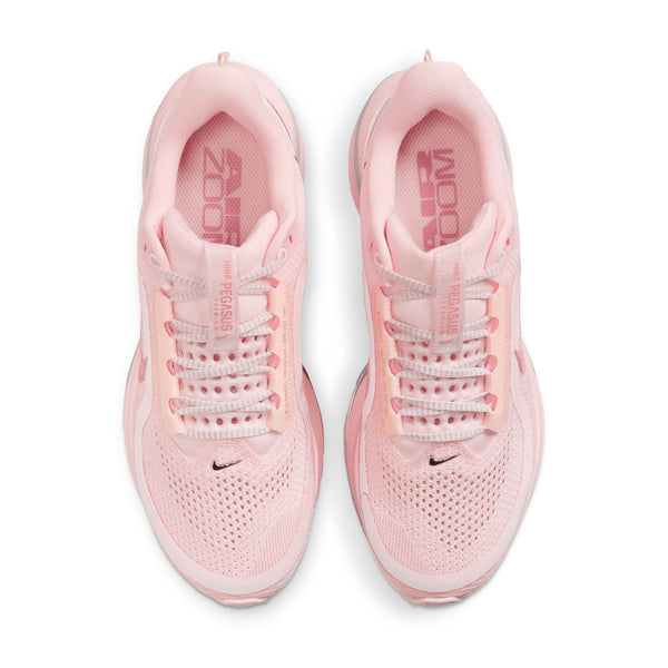 This Women's Nike shoe is all over light pink.