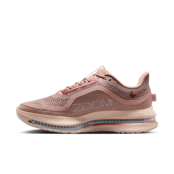 Women's Nike running shoe with the large Zoom logo on the medial side.