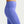 Close-up of purple leggings on a plain background