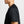 Black t-shirt with distressed details on a plain background
