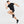 Person wearing a black athletic outfit with a Nike logo on a white background
