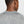 Person wearing a gray athletic shirt on a light gray background