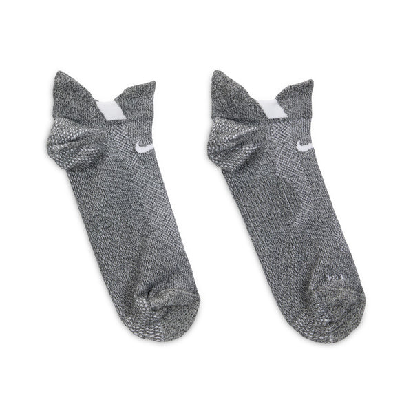 Pair of gray socks with white accents on a white background