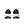 The heel area of a Nike Vomero Plus black and white athletic shoes on a white background.