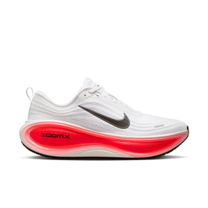 White running shoe with red sole on a white background.