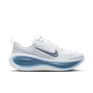 White running shoe with blue sole on a white background