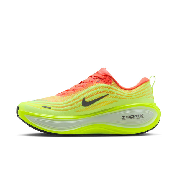 Neon green and orange running shoe with Nike logo on a white background.