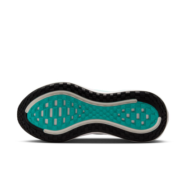 Close-up of a shoe sole with a unique tread pattern on a white background.