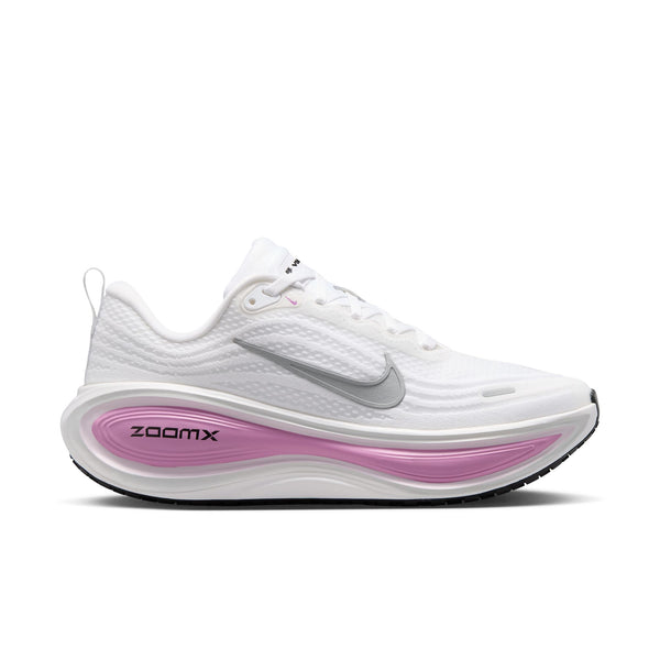 A Nike running shoe in white with a metallic silver Swoosh and a pink ZoomX midsole accent, shown on a white background.