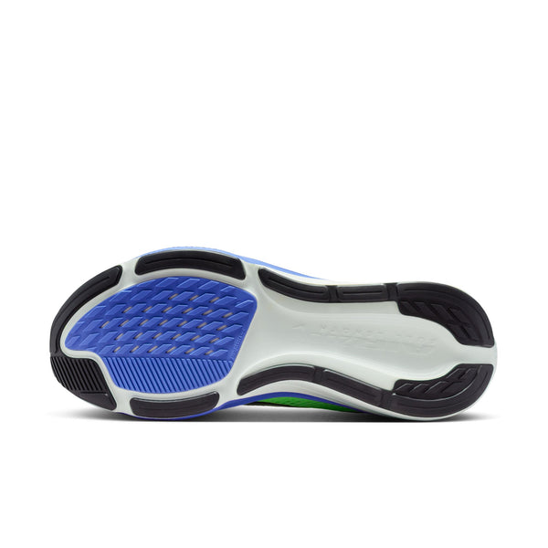 Close-up of a shoe sole with blue and black design on a white background