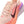 Close up on a women's nike shoe with light pink laces that match the upper material.