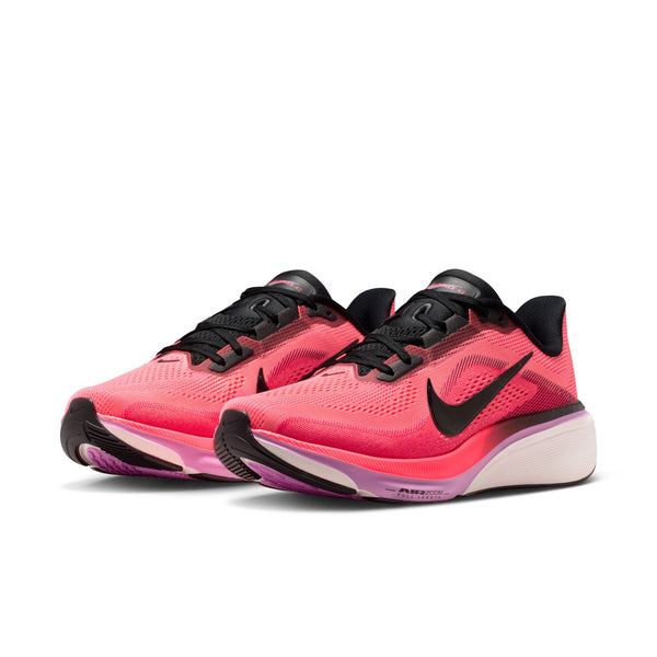 Pink and black women's Pegasus 42 running shoes with Nike logo on a white background