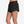 Black athletic shorts with a Nike logo on a white background