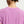 Close-up back view of a person wearing a short-sleeve athletic top in light purple/lavender, showing the neckline, shoulder seams, and small vertical cutout details near the lower back.