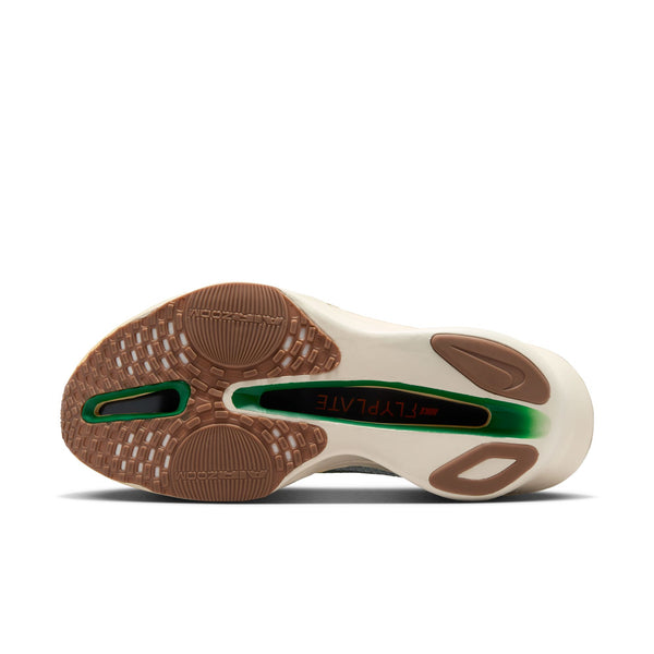 Close-up of a shoe sole with brown and beige color scheme on a white background.