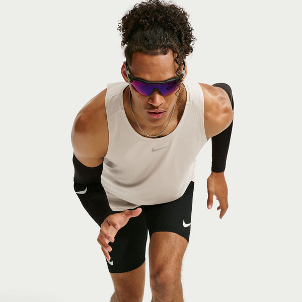 Person wearing Nike athletic gear on a white background