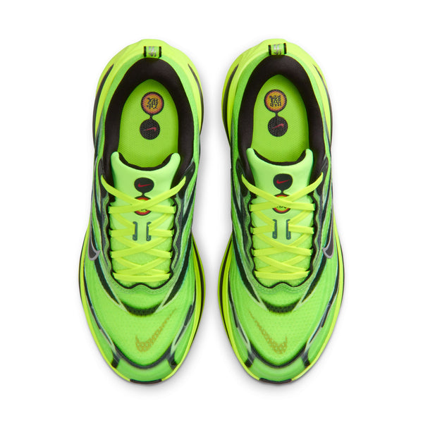 Pair of neon green sneakers with black accents on a white background