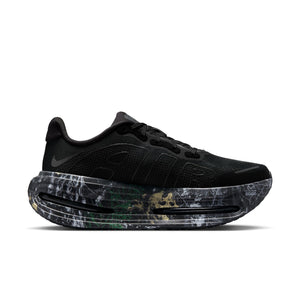Black Premium sneaker with a unique sole design on a white background.