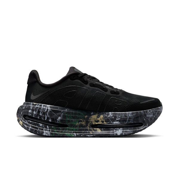 Black Premium sneaker with a unique sole design on a white background.