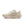 The medisl side of a beige and white women's running shoe with Nike logo on a white background.