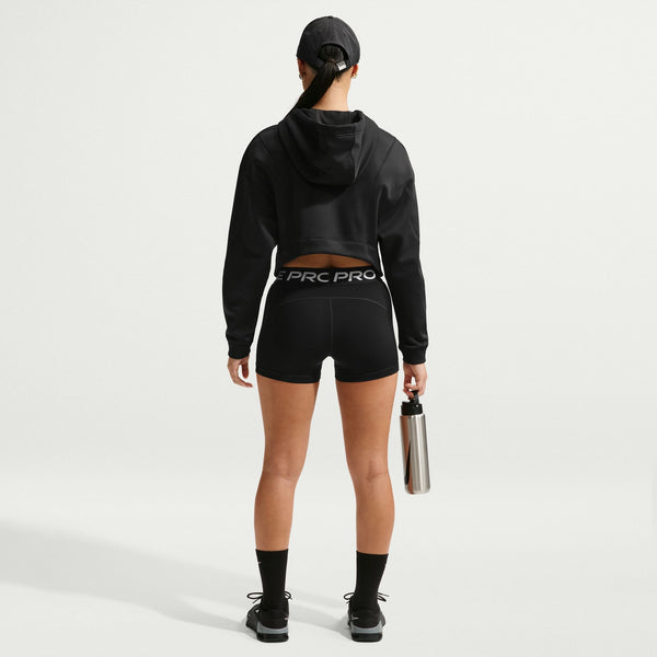 Person wearing a black hoodie and shorts with 'PRO PRO' branding, holding a water bottle on a light gray background.