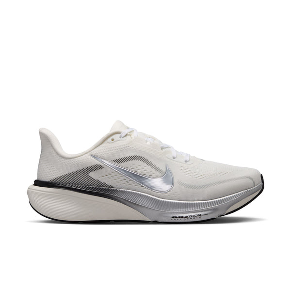White running shoe with pink accents on a white background