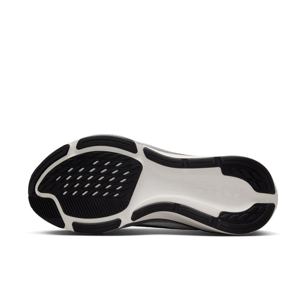Black and white athletic shoe sole on a white background