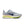 Gray running shoe with Nike logo on a white background