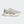 the lateral side of an adidas running shoe that is mostly white adn grey based.