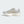 The medial side of a women's adidas shoe with an off white midsole.