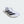 White running shoe with black stripes on a light gray background