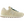 A New Balance sneaker in cream suede and leather with dark green laces, shown from on a white background.