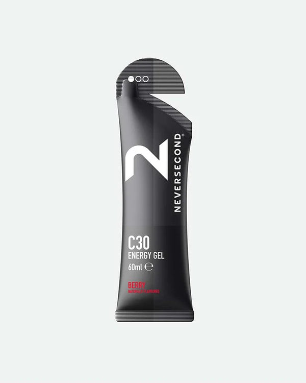 A single-serve black gel stick packet of Neversecond C30 Energy Gel in Berry flavor, shown on a light gray background.