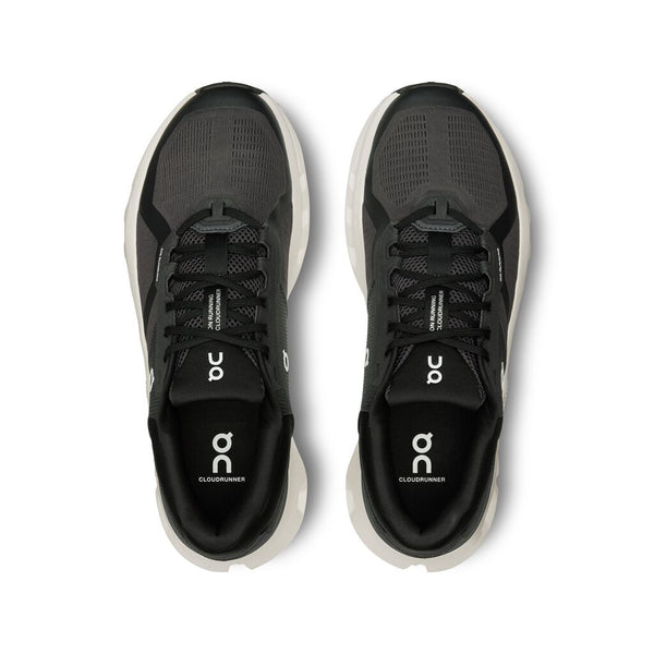 Black running shoes with 'On' branding on a white background.