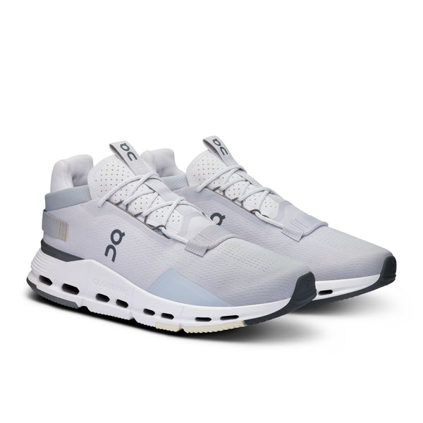 Pair of gray and white athletic shoes on a white background
