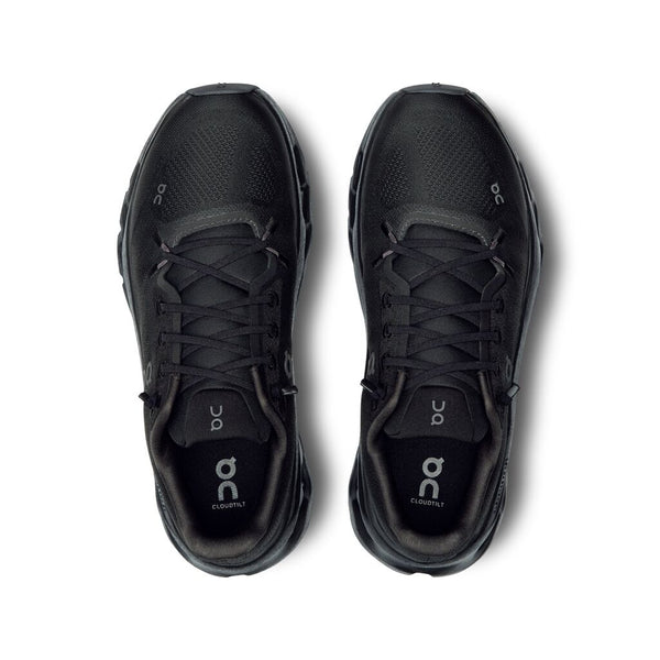 A pair of Cloudtilt Lifestyle shoes from On that are all black.