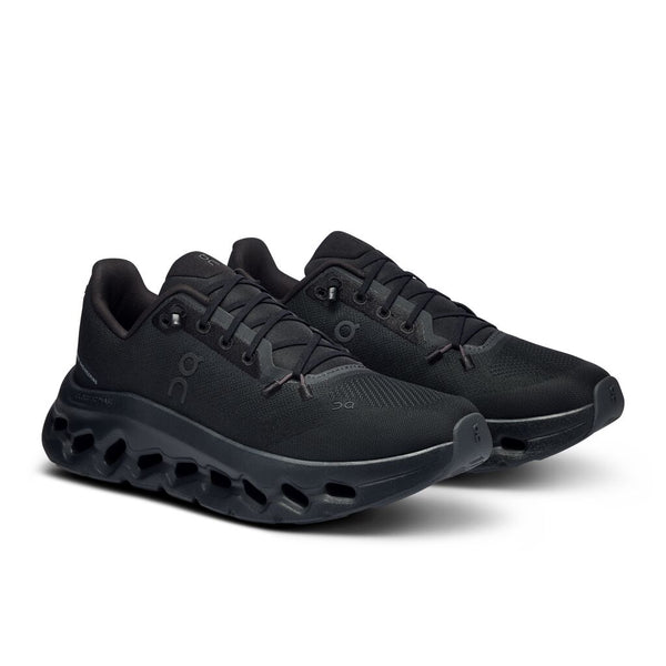 A pair of all black On lifestyle shoes.