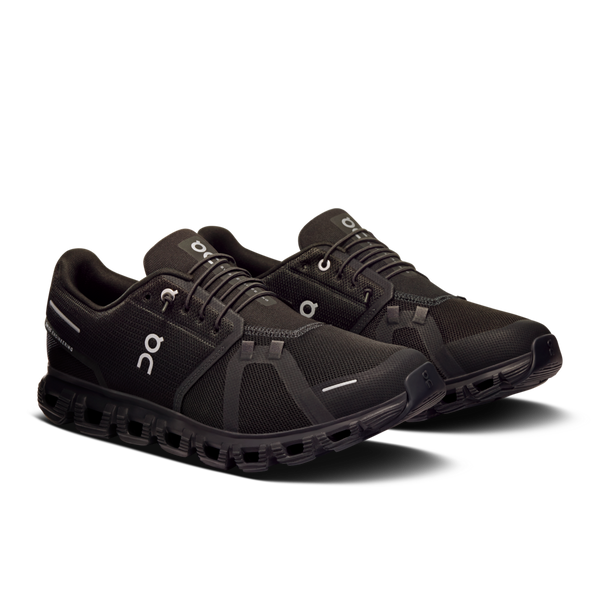 A pair of On Cloud 6 shoes in colorway black and black.
