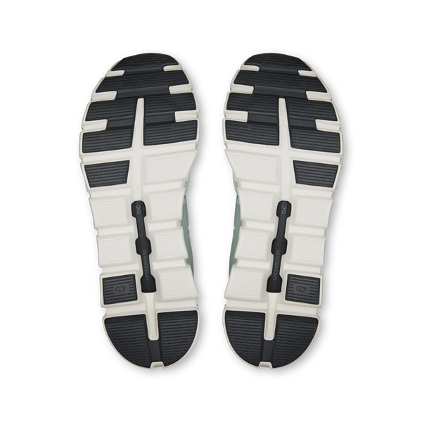 The outsoles of these men's on shoes are all white and black.