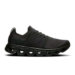 A pair of black athletic shoes with a unique sole design, likely intended for running or similar activities.