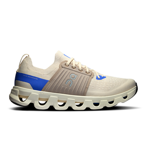 A pair of men's running shoes with white uppers and blue and gray accents.
