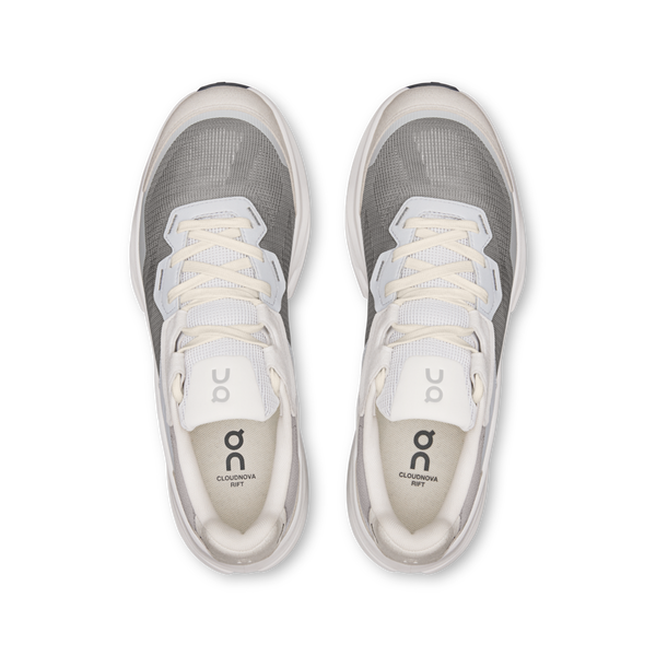 Gray and white running shoes with 'on' branding on a white background