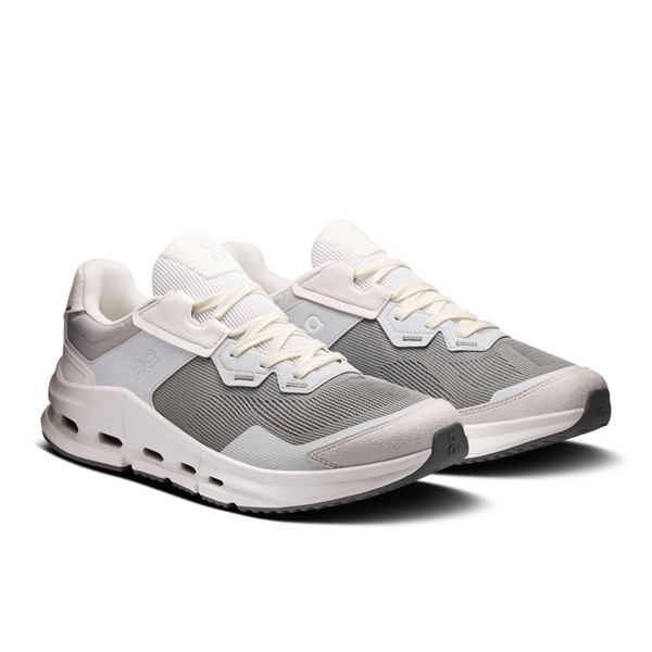 Gray and white sneakers on a white background