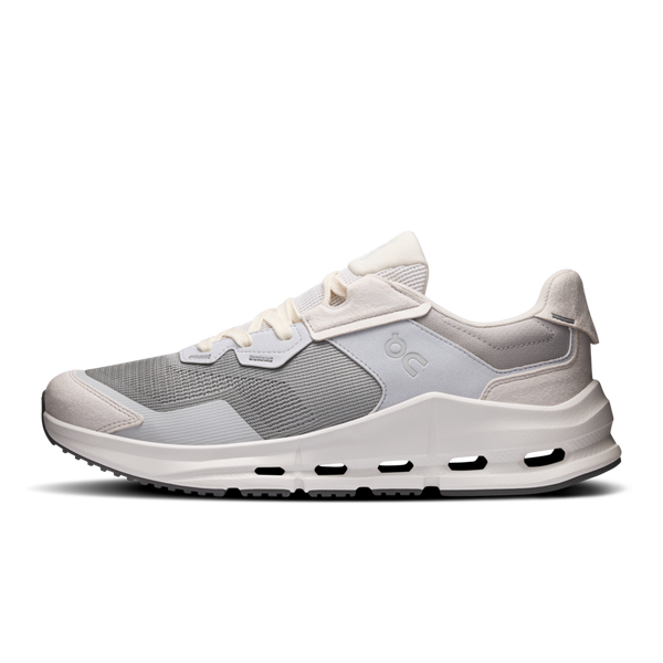 White and gray athletic shoe on a white background