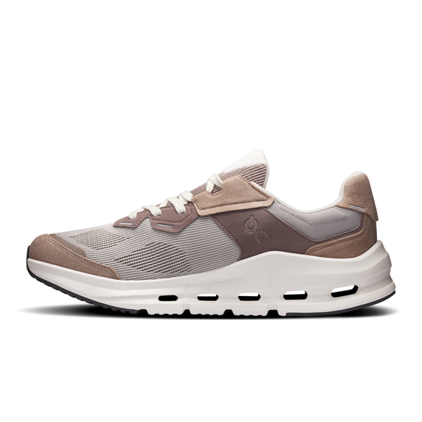 Gray and brown sneaker with white sole on a white background