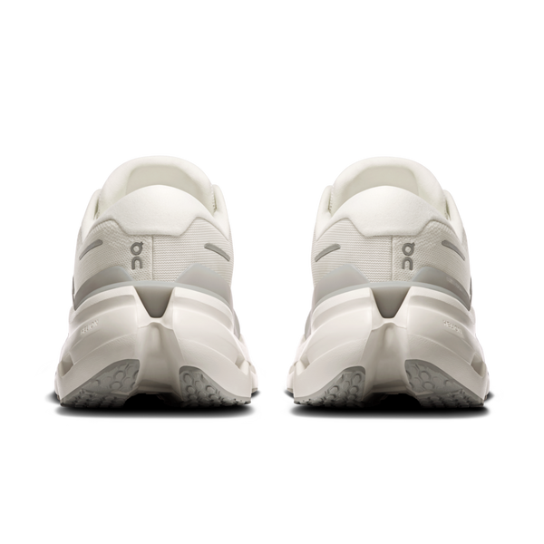 White running shoes with visible 'On' branding on a white background