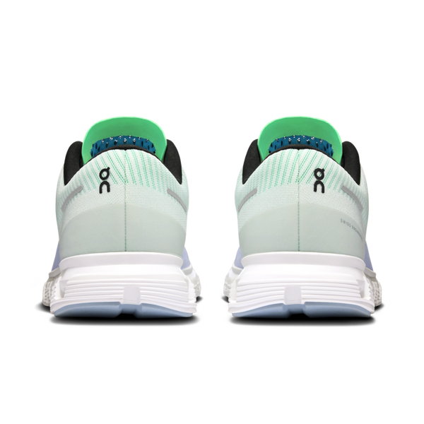 The inside of the tongue of this women's shoe is a bright green.