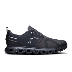 On waterproof black running shoe with a unique sole design on a white background.