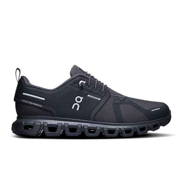 On waterproof black running shoe with a unique sole design on a white background.